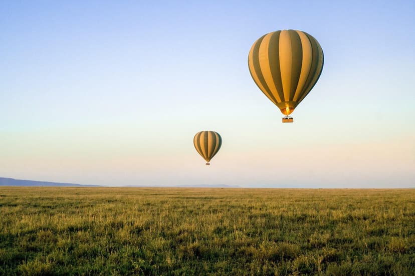 Hot-air balloon at dawn over the Serengeti