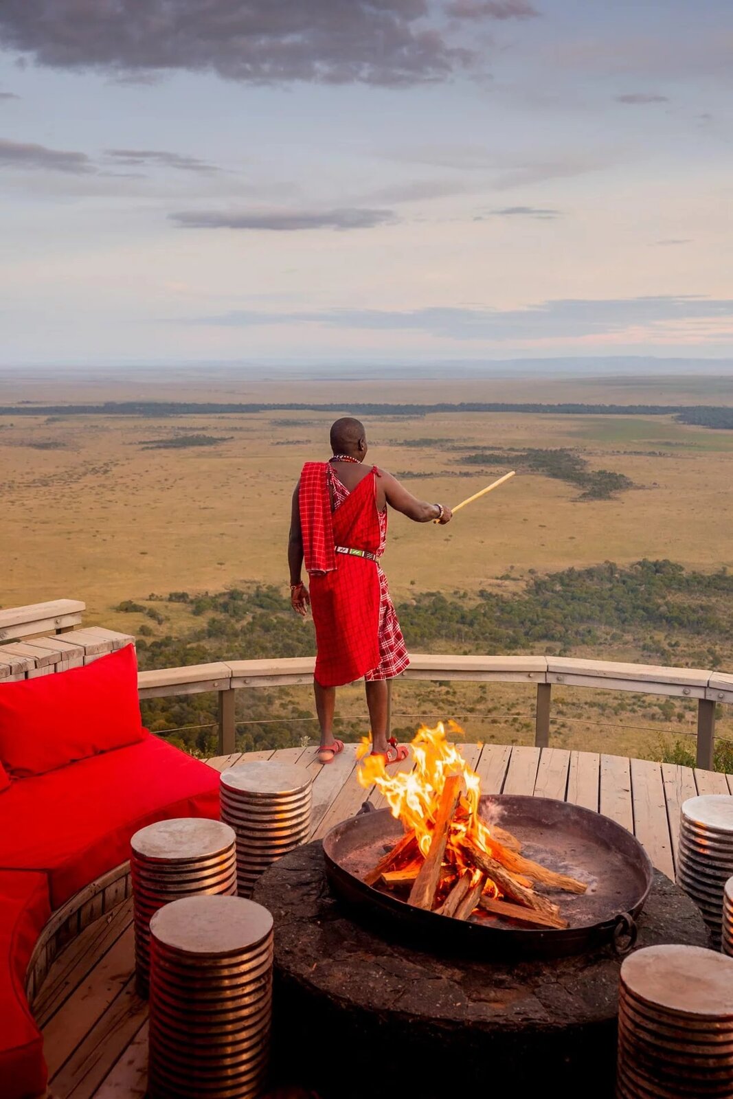 Warrior fire-pit sundowner overlooking the Mara Triangle at Angama Mara