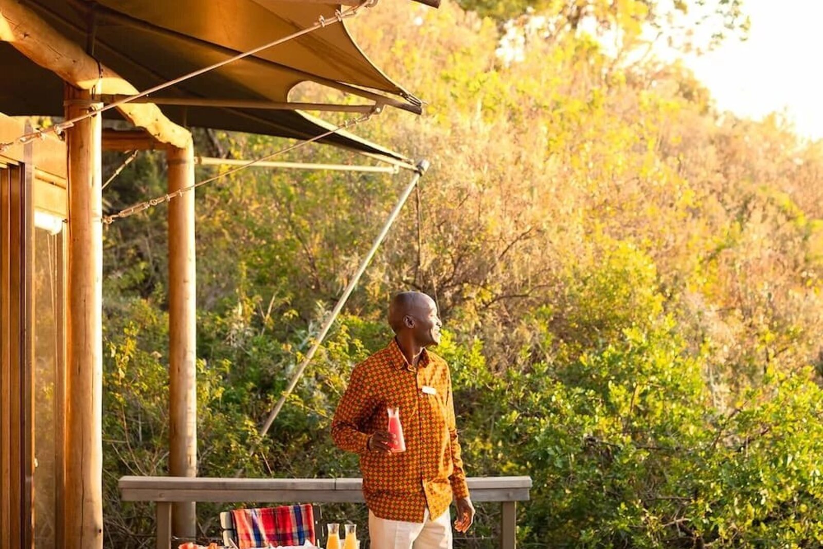 Private deck dining overlooking the Masai Mara plains